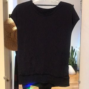 Navy luxtreme top with sheer detailing on back